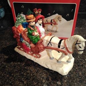 Brinn's musical Christmas sleigh figurine